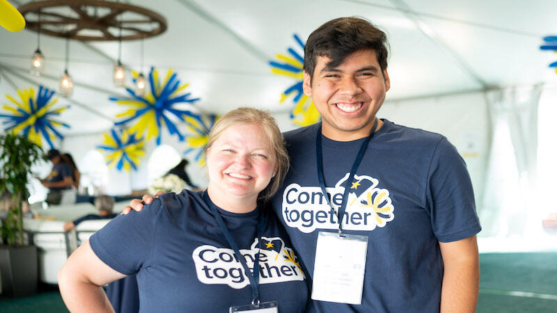 UDAR staff Caroline Allum and Joseph Gonzalez volunteering at UC Berkeley's 2022 Homecoming