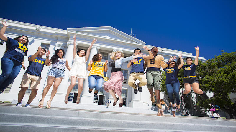 UC Berkeley Admin Day - student jumping with excitement